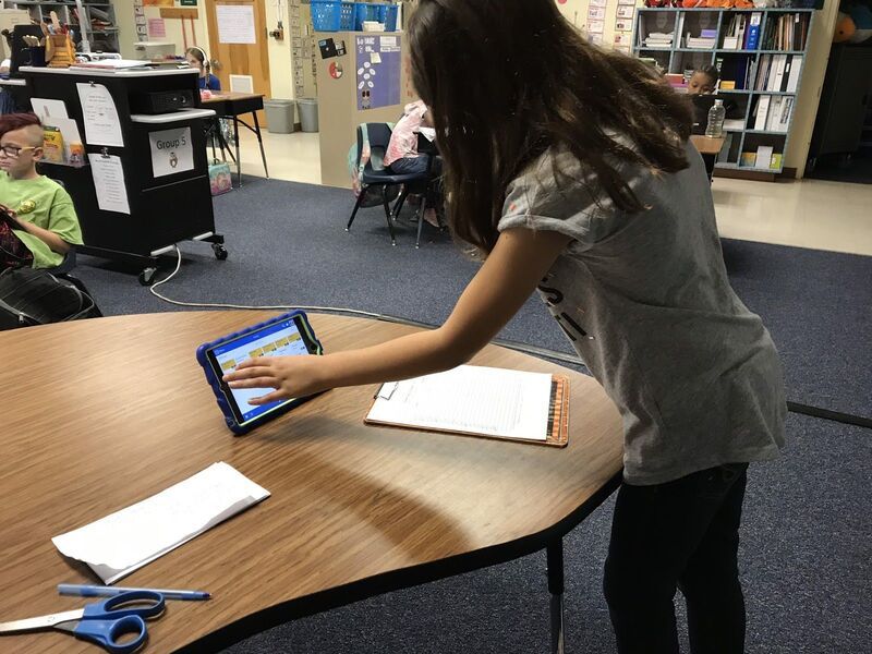Student using LiveSchool to choose a PBIS reward
